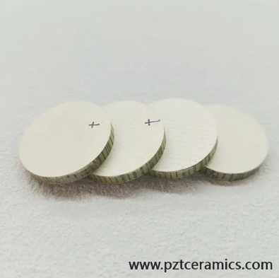 Пьезоэлектрический композитный материал